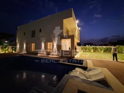 Villa for sale in Al Feda Gardens in Sekh Zayed Compounds, Sheikh Zayed, Giza - 31,500,000 EGP