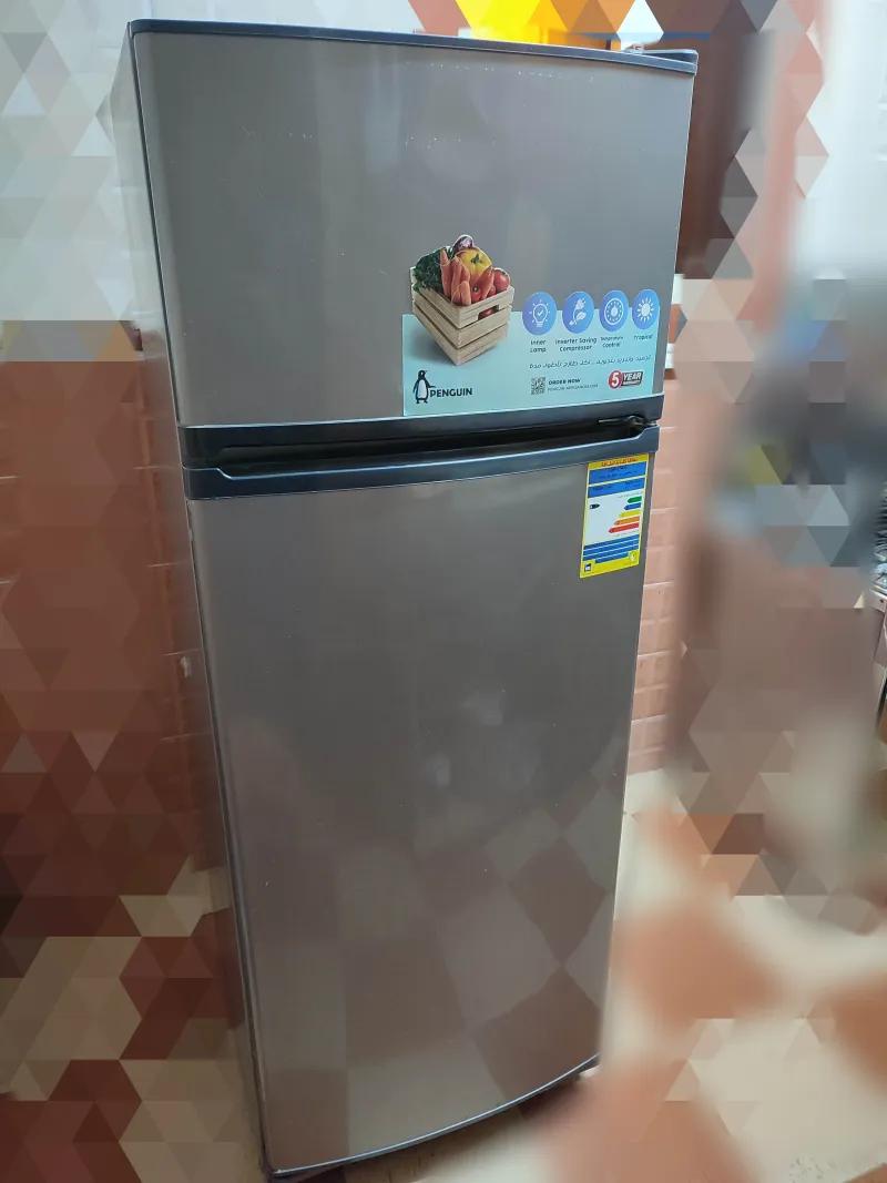 ثلاجه بنجوين بابين ديفروست سعة ٣٠٢ لتر