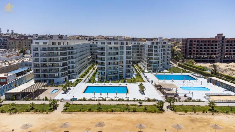 شقة 100م² أوضة وصالة بإطلالة مباشرة على البحر منتجع سكانديك