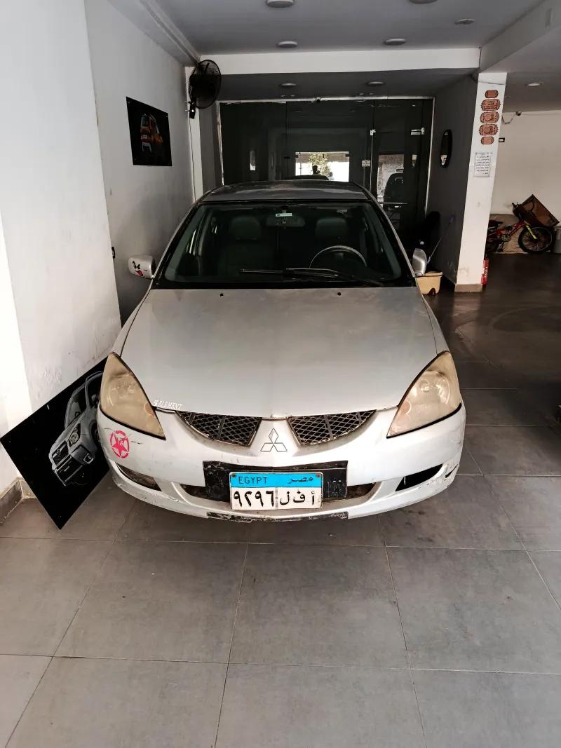 عربيه لانسر بومه