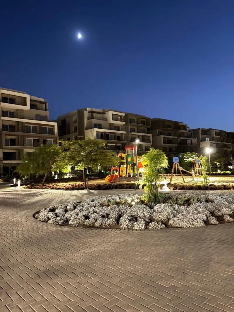 ارضي بجاردن للبيع في palm hills new cairo متشطبة بالكامل