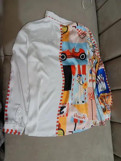 بلوزة ستان منقوشة بيضاء في شبين الكوم, المنوفية - 250 EGP