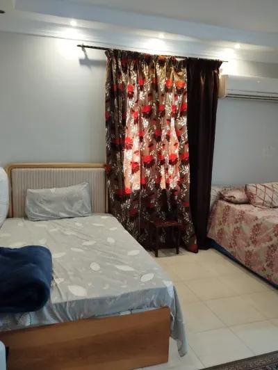 سرير فى غرفة دابل بنات