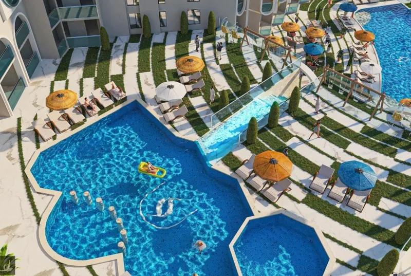 شقة 106م غرفتين وصالة عقد اخضر SEA&POOL VIEW